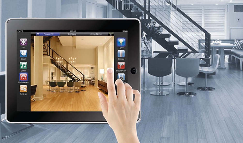 Hands setting a security system on an IPad